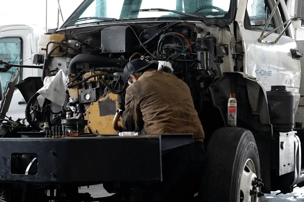 Diesel Truck Tuning by RDI Power in Brooksville, FL. A mechanic inspecting a diesel engine during routine maintenance