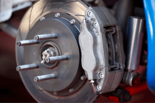 The Benefits of Checking Your Vehicle’s Brakes Frequently by RDI Power in Brooksville, FL. Image of a car brake caliper.